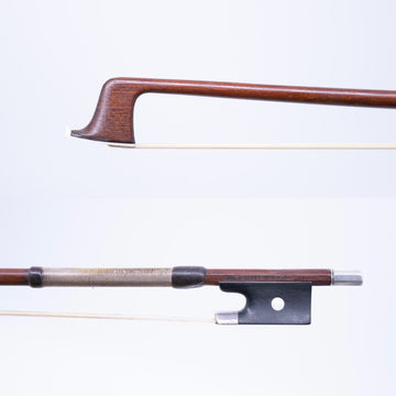 A Silver Mounted Violin Bow From Carl Fischer, New York.